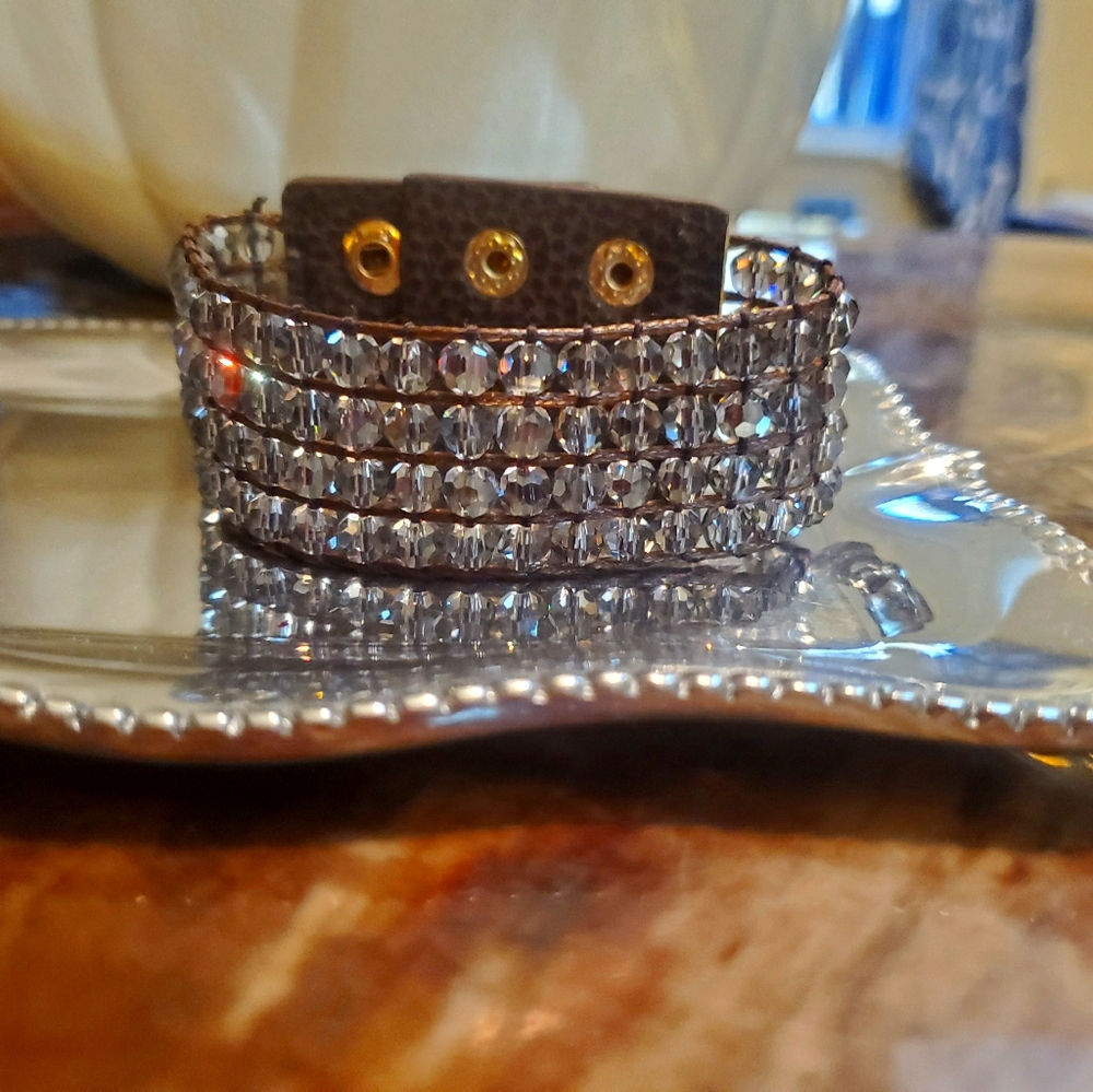 NWO tags,  never worn . Leather snap cuff with rhi